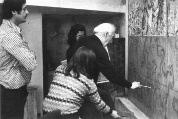 Marc Chagall, Micel Tharin and two women are studying a mural mockup.