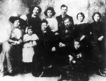 Family photograph with Marc Chagall posing with his parents and young sisters.
